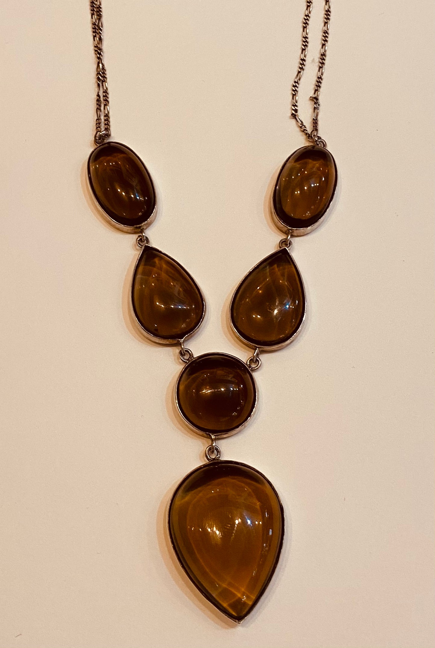 Smokey quartz in white metal mount with sterling silver chain