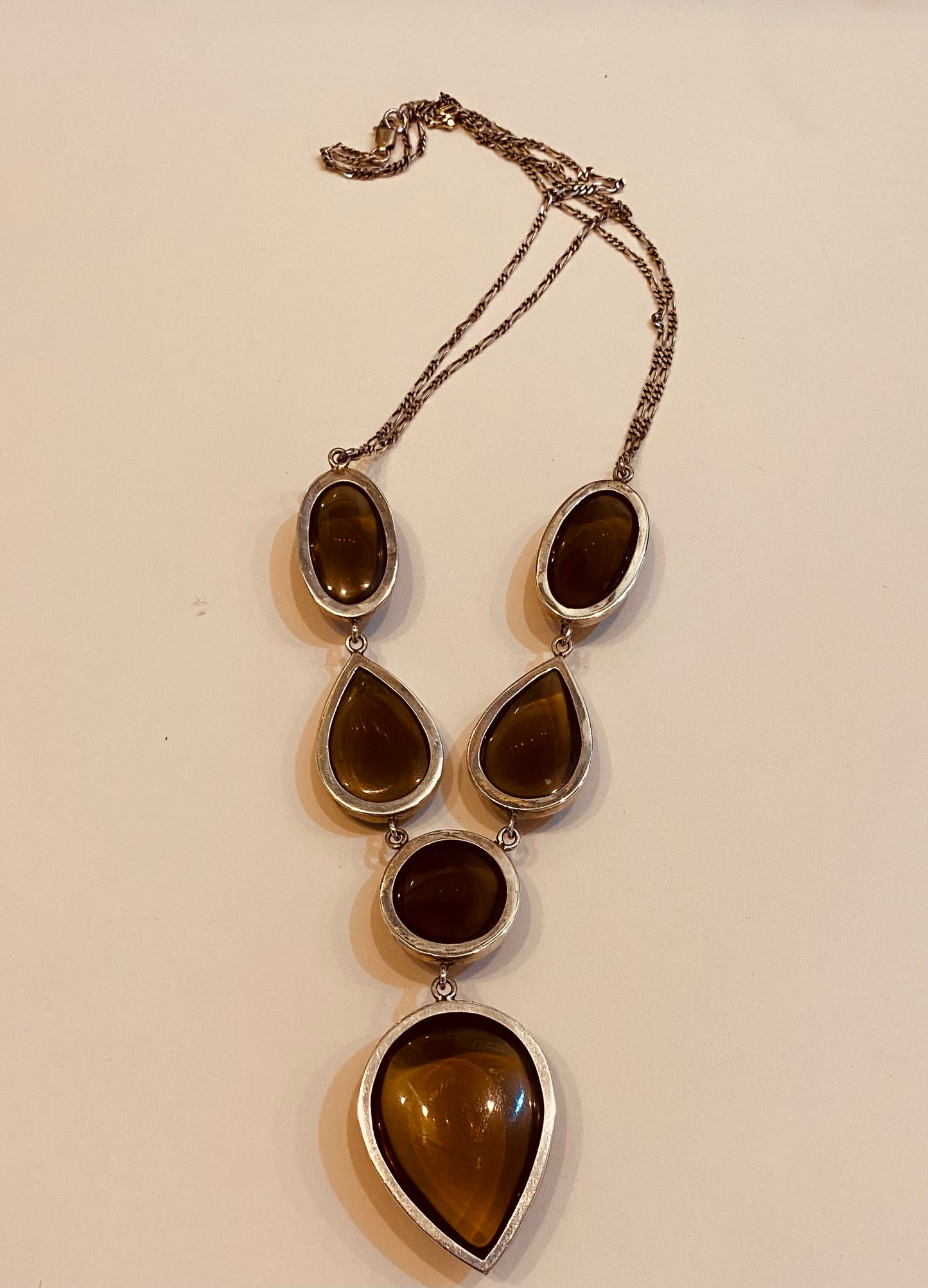 Smokey quartz in white metal mount with sterling silver chain