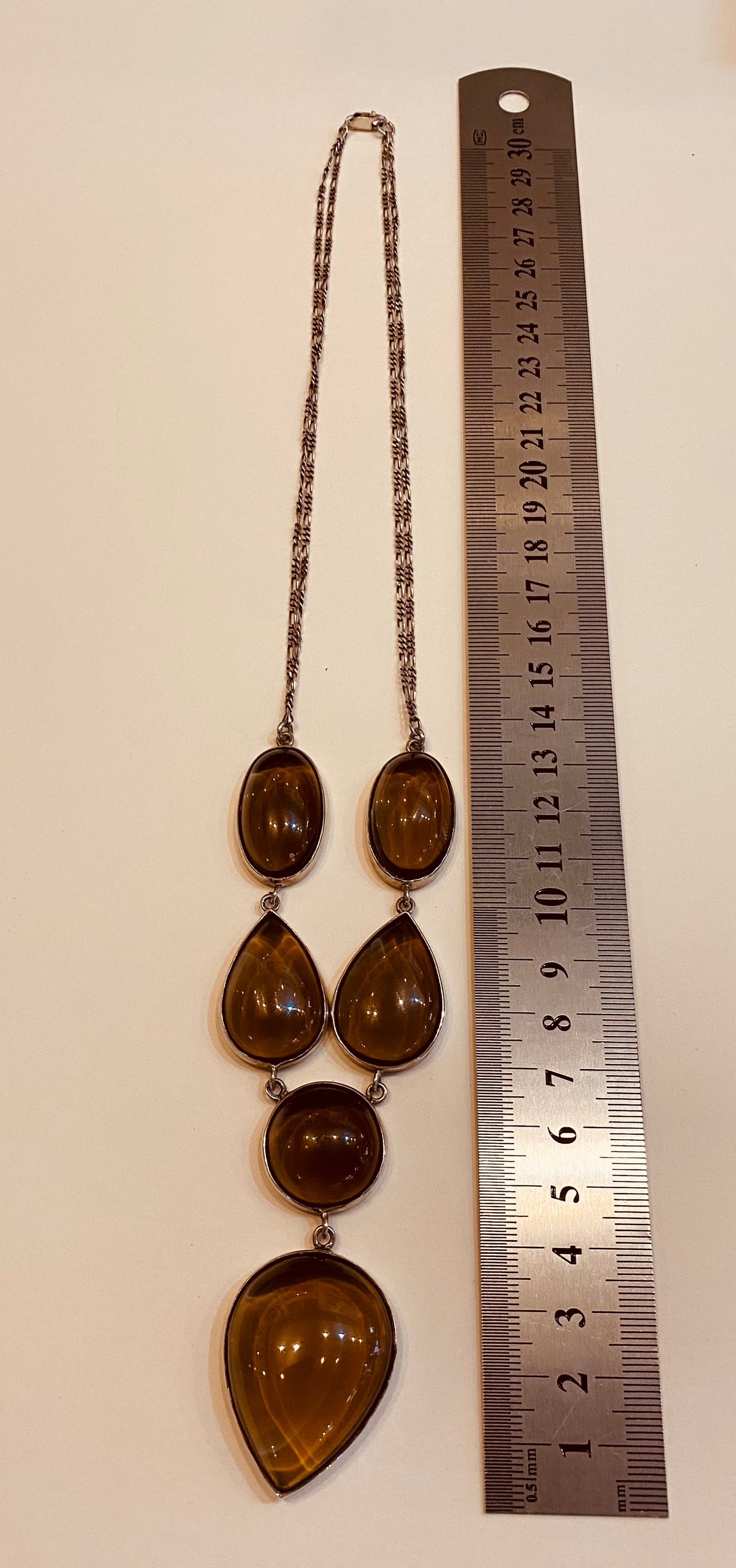 Smokey quartz in white metal mount with sterling silver chain