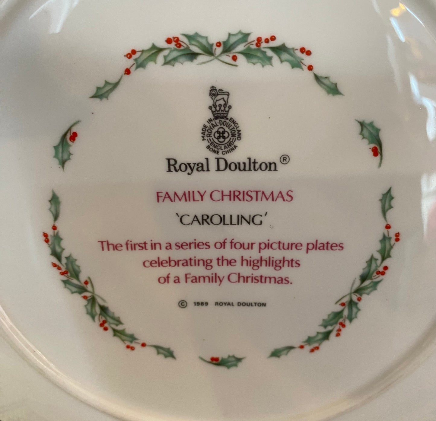 Royal doulton family Christmas China four plate set