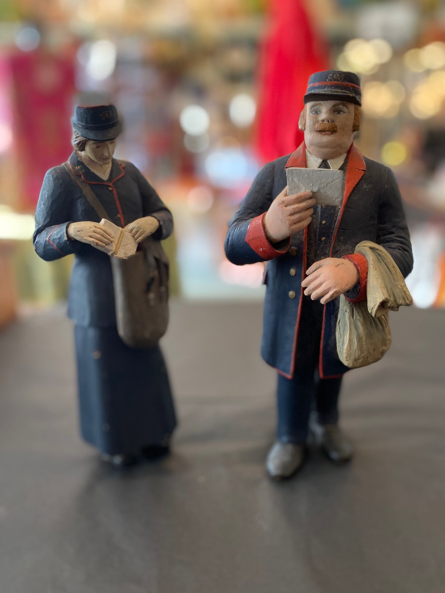 First World War British postman and postwoman hand carved and painted figurines