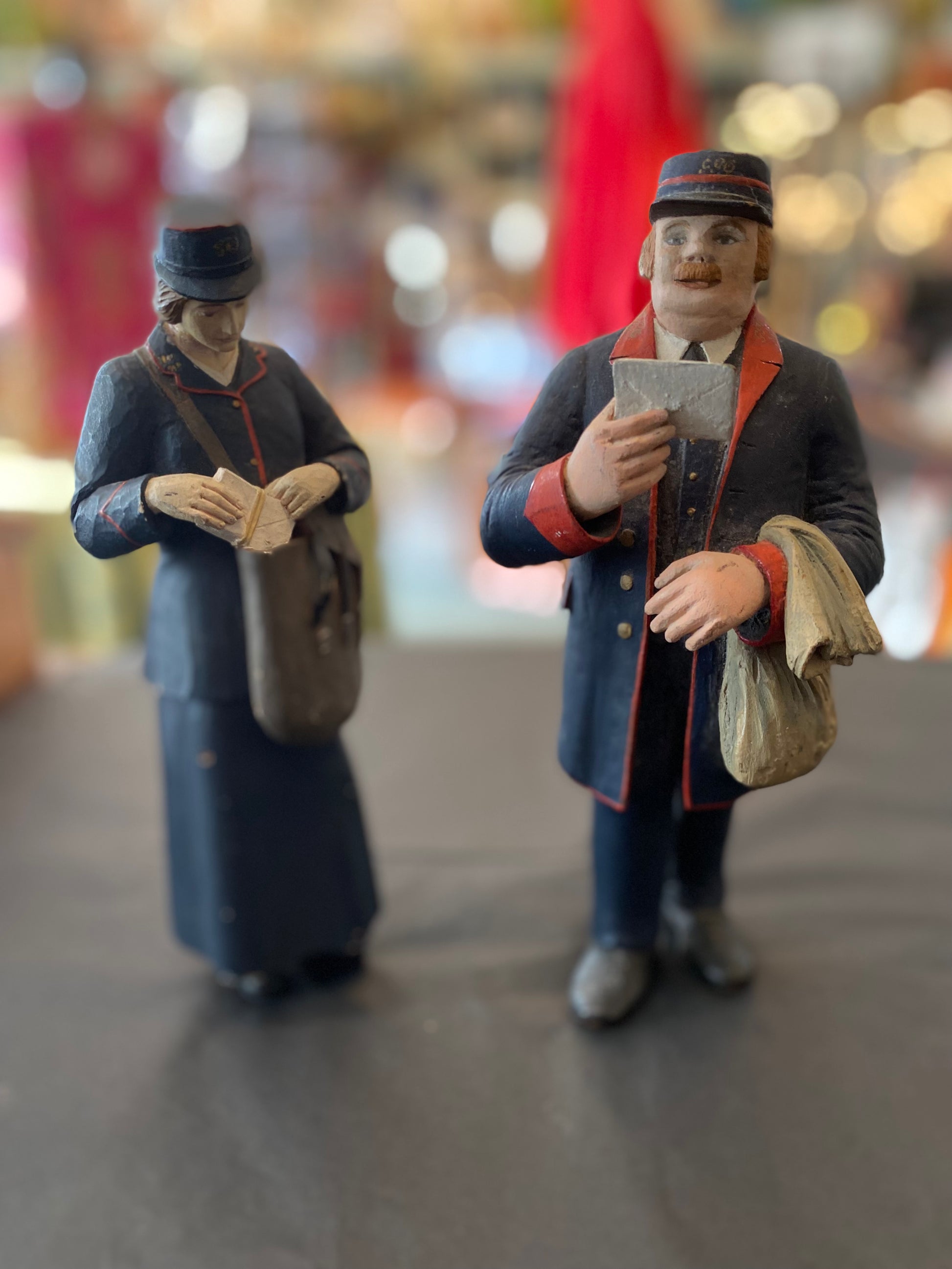 First World War British postman and postwoman hand carved and painted figurines