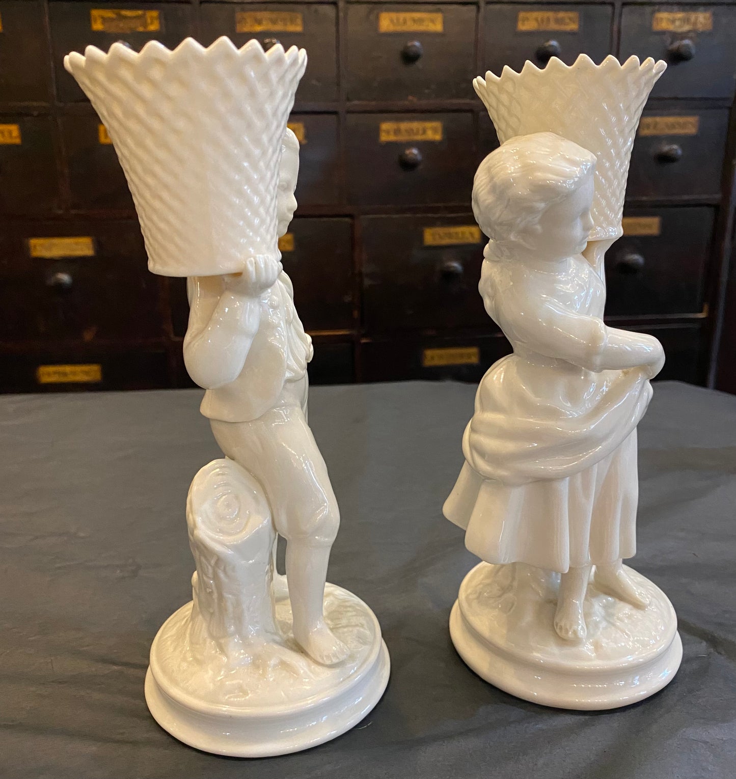 1990s Belleek boy and girl basket bearers
