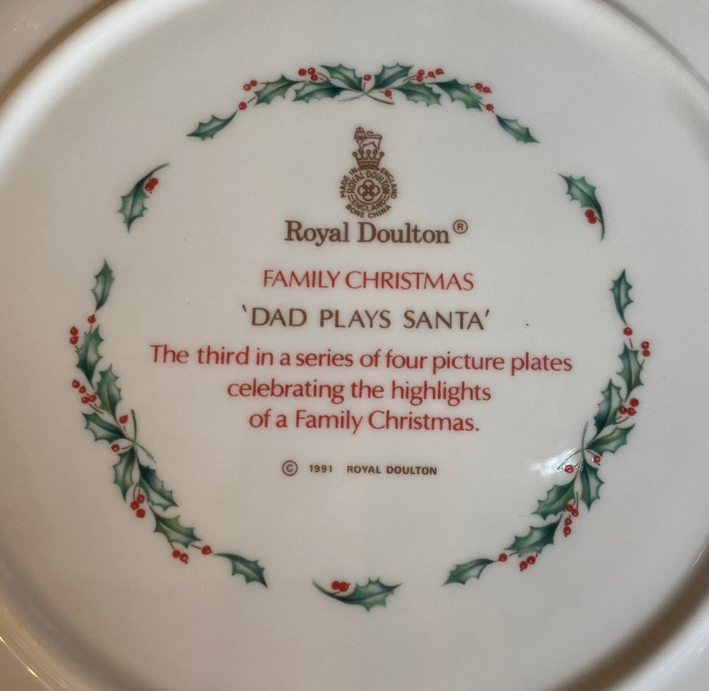 Royal doulton family Christmas China four plate set