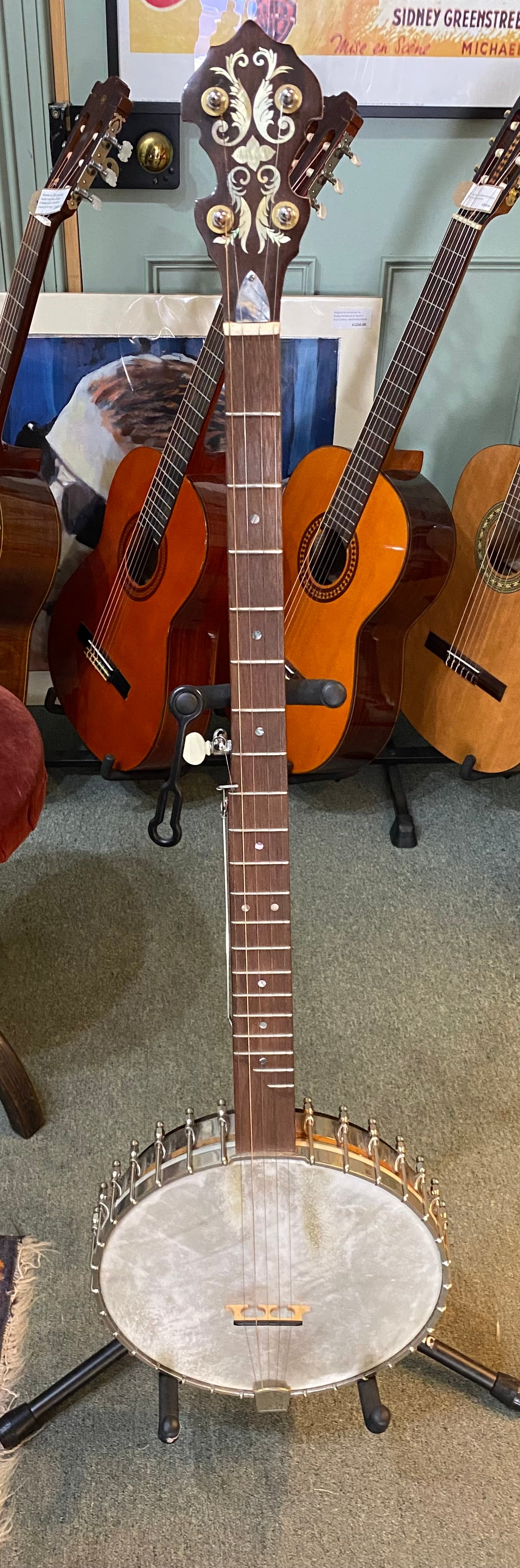 1923 Vega Tubaphone long neck conversion. Pot serial number 59268 dates it to 1923. Pot is 11 7/8” fibraskin head. Scale length is 32 1/4”.