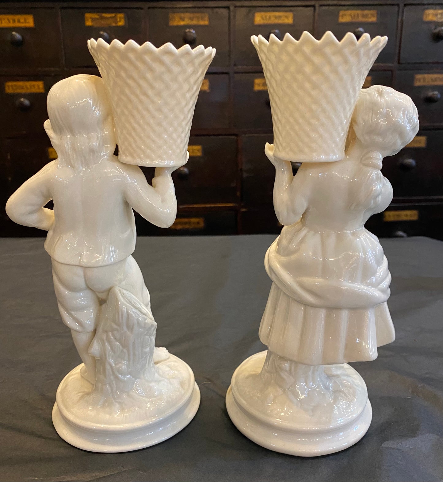 1990s Belleek boy and girl basket bearers
