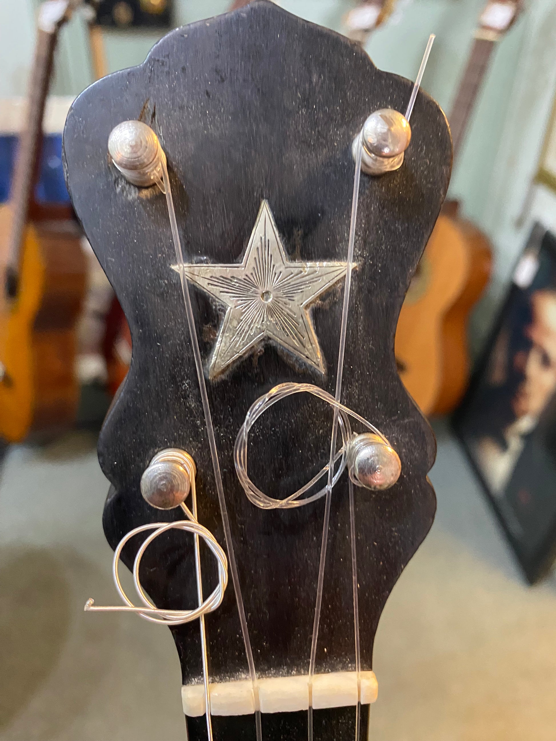 Chicago based J B Schall 5 string open back banjo circa 1890. 12" pot, 16 frets, 28" scale length, superb condition for its age, plays beautifully with that rich deep 12 inch sound.