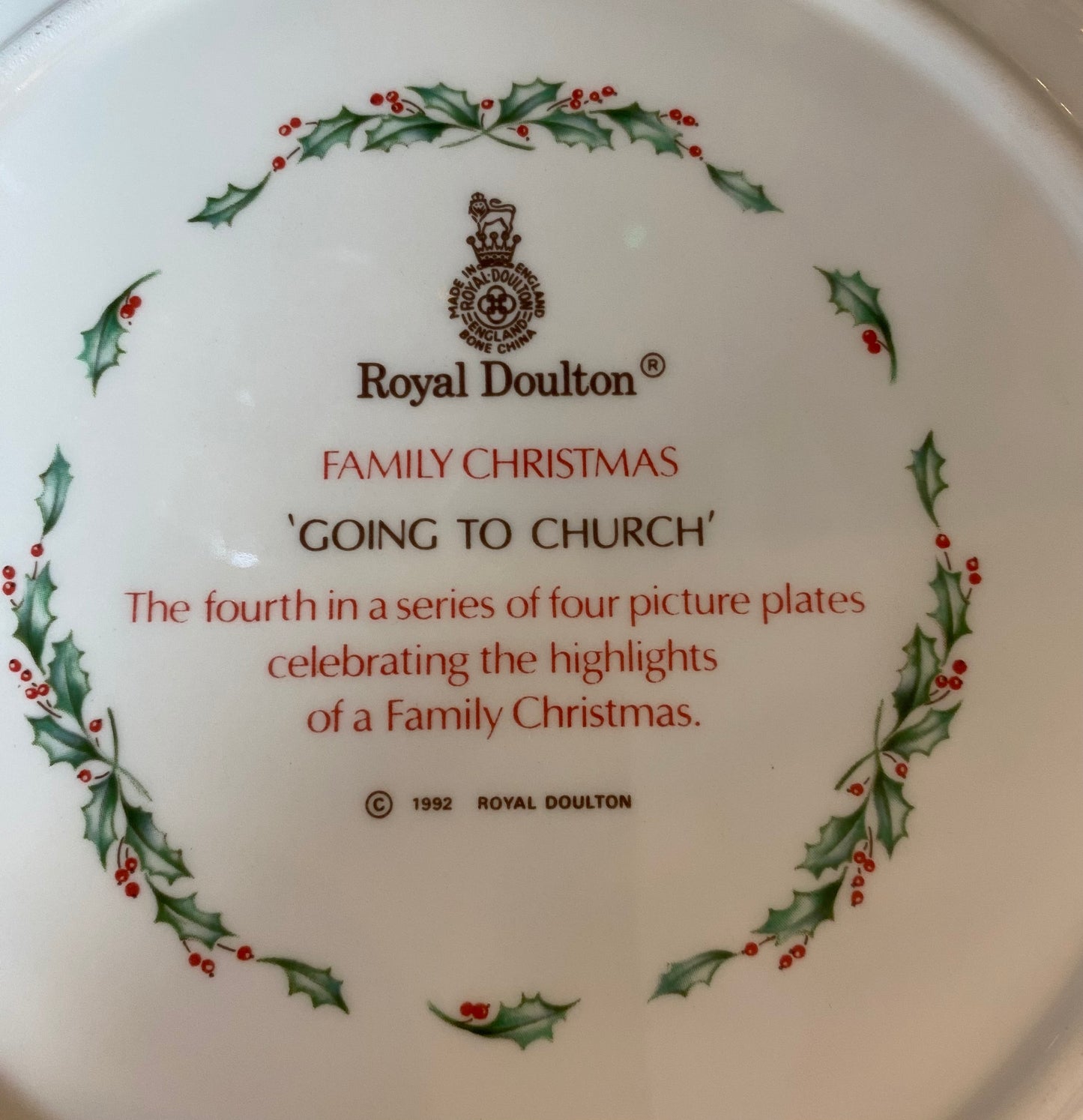 Royal doulton family Christmas China four plate set