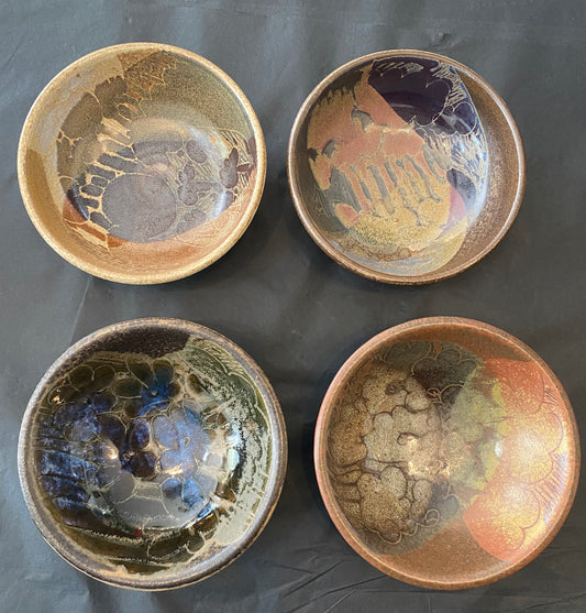Shop this authentic 1970s set of 4 wheel-thrown stoneware bowls by Diana Worthy of Crich Pottery. Featuring a striking blue-green reactive glaze.